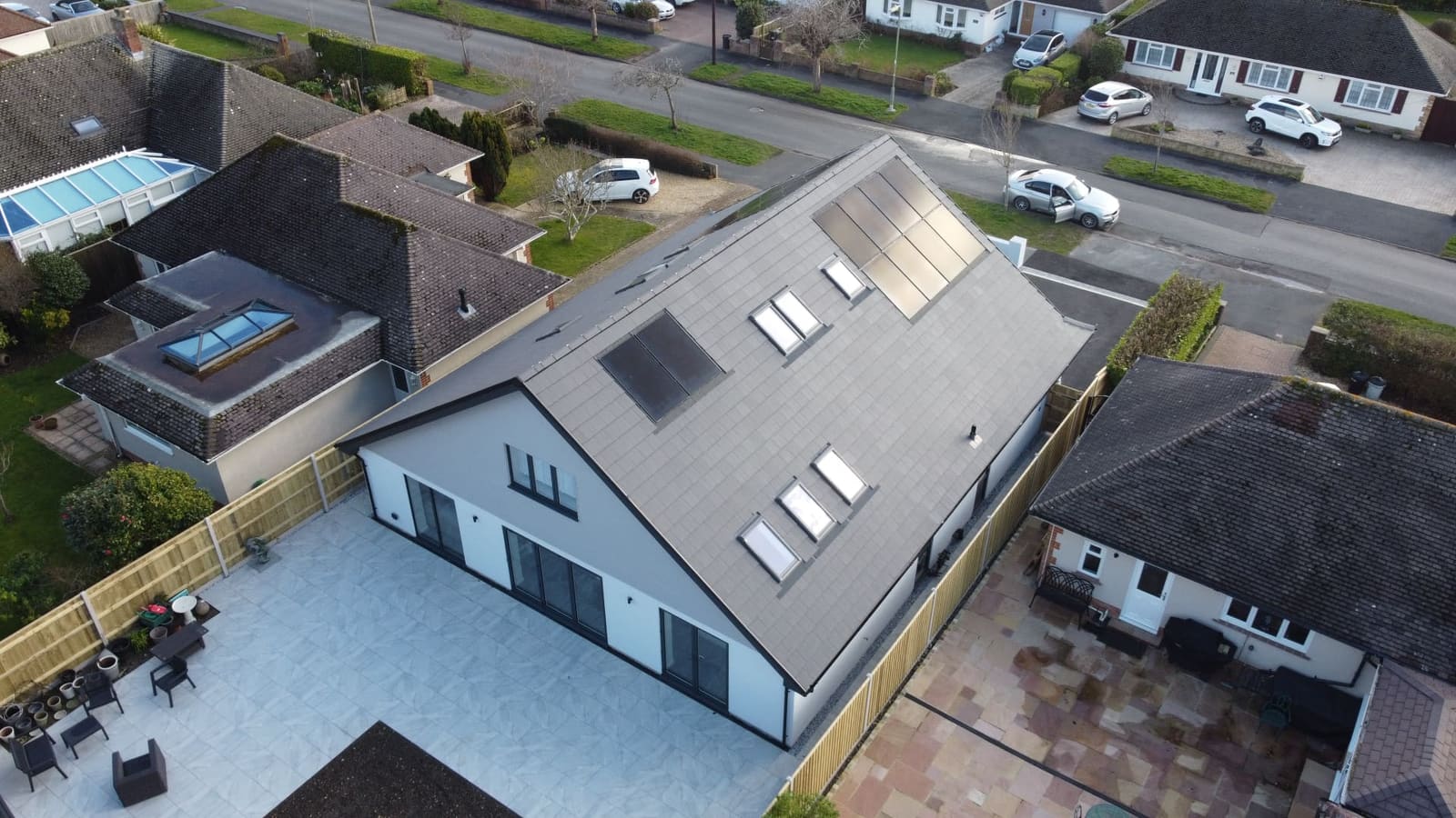 Aerial view of a new build home with in-roof solar panels